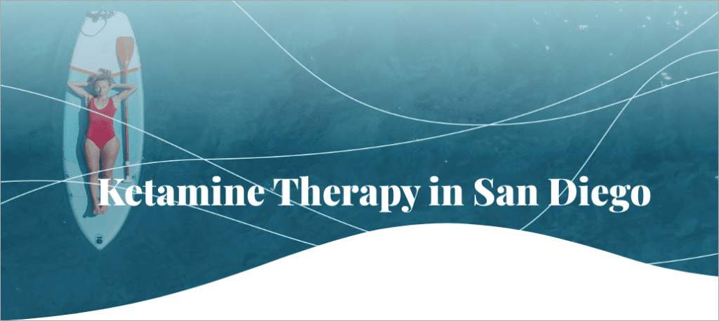 A woman in a red swimsuit lies on a white surfboard floating on blue water. The text "Ketamine Therapy in San Diego 2024" is displayed across the lower half of the image. White wave-like lines are superimposed over the scene, adding a serene touch to this striking marketing visual. - Ketamine